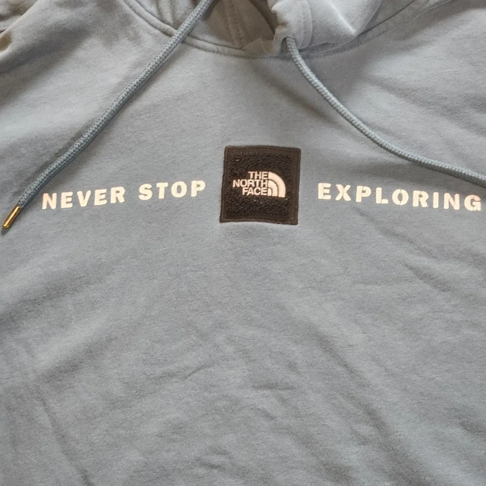 The North Face Hoodie Mens 2XL Blue  Fleece Pullover Never Stop Exploring